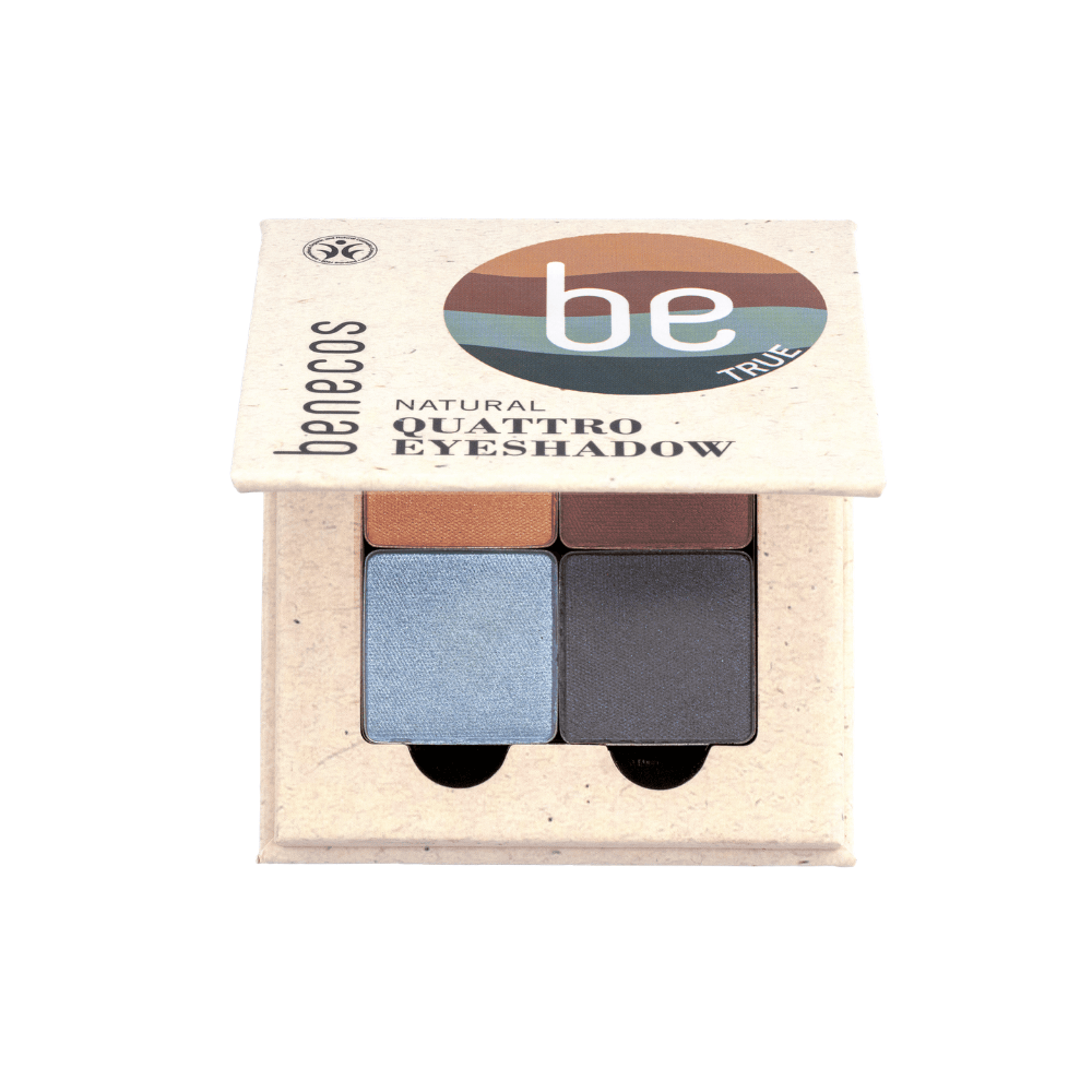 Benecos Natural Quattro Eyeshadow quad in its kraft paper packaging, showing four shades: a shimmering light blue, a matte brown, a deep brown, and a dark charcoal gray.
