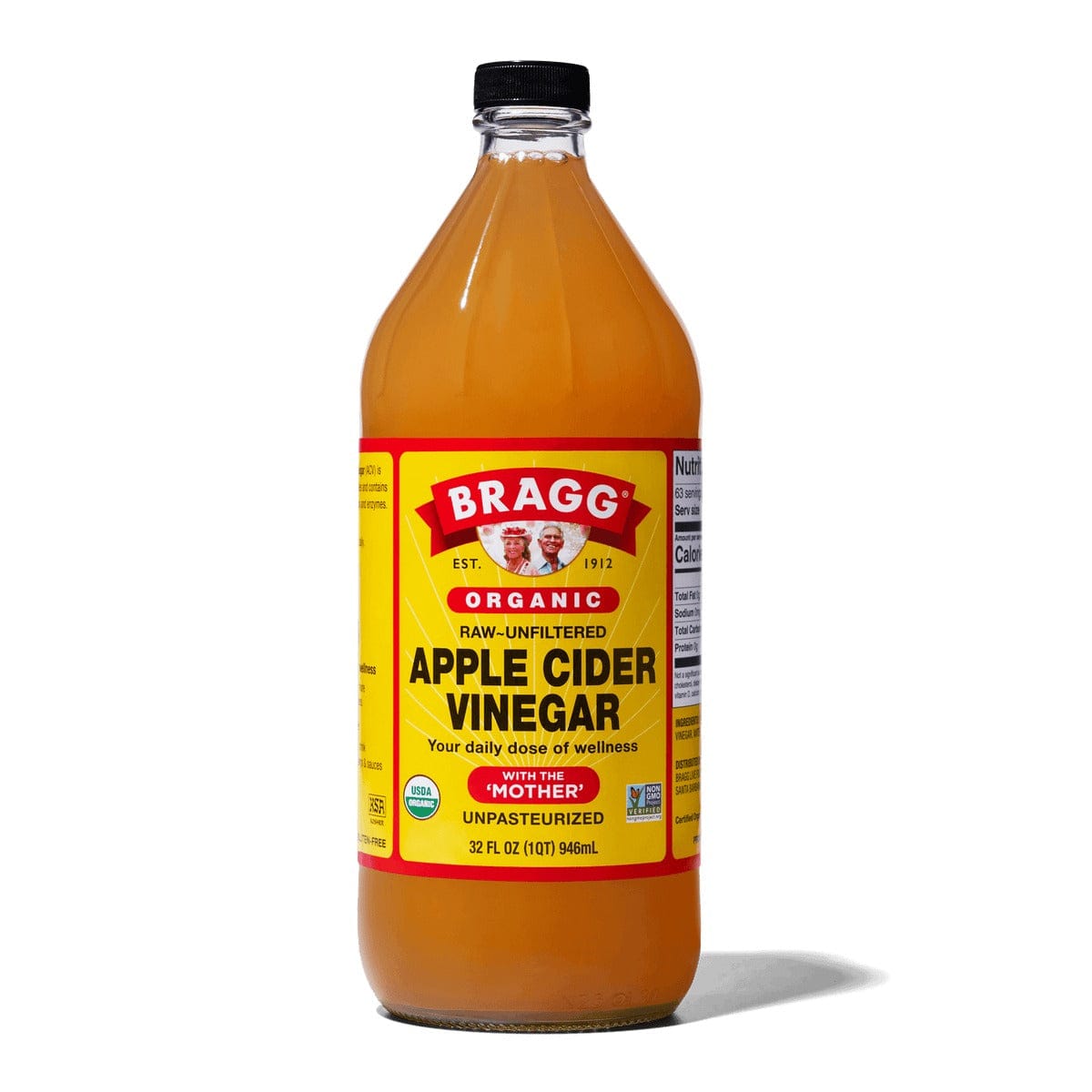 Bottle of Bragg Organic Apple Cider Vinegar on a white background