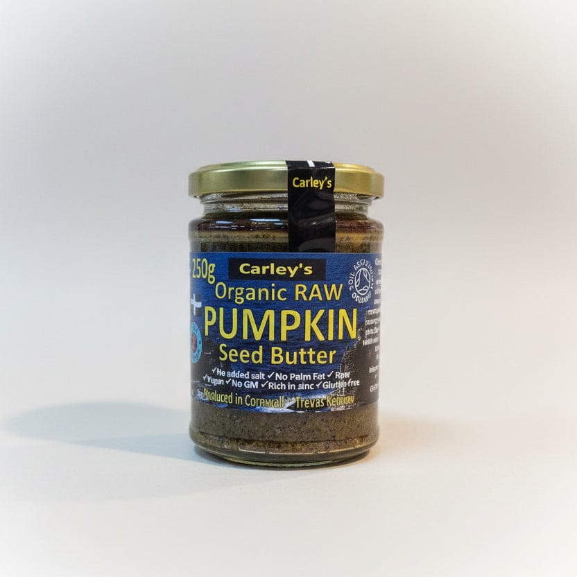 Jar of Carley's Organic Raw Pumpkin Seed Butter on a white background