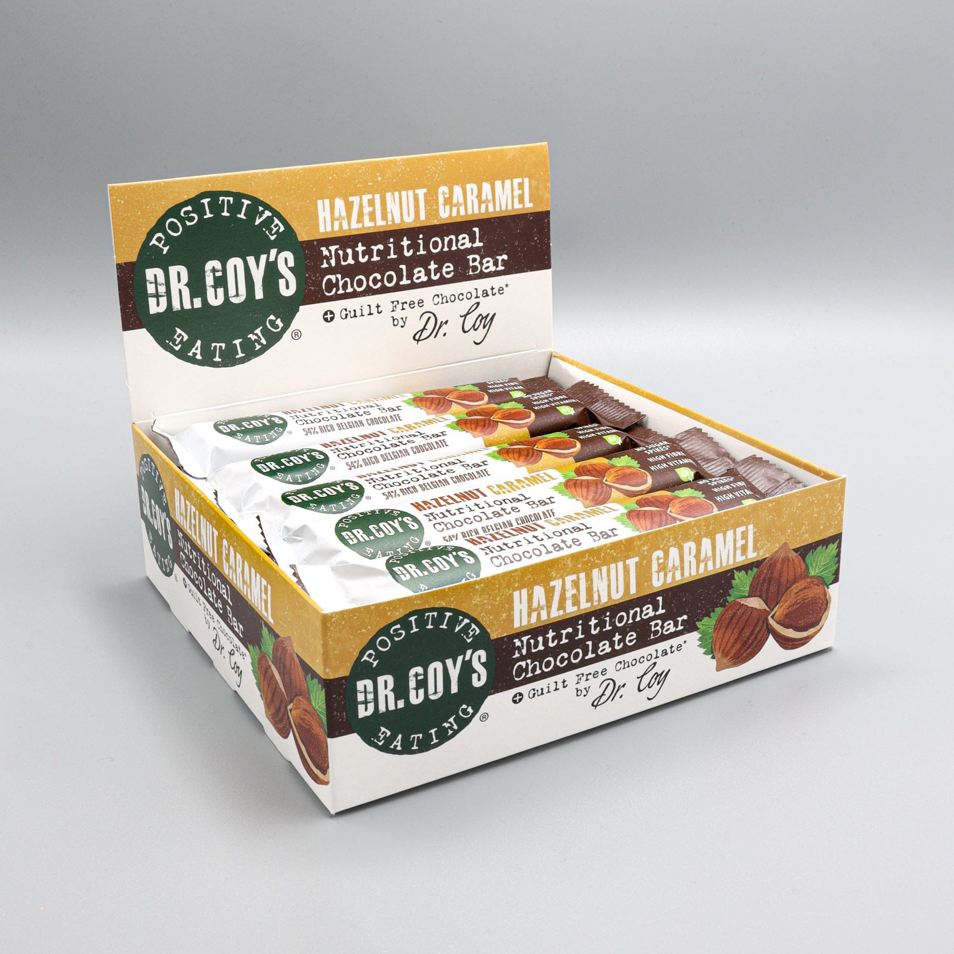 Box of Dr. Coy's Hazelnut Caramel Nutritional Chocolate Bars on a gray background