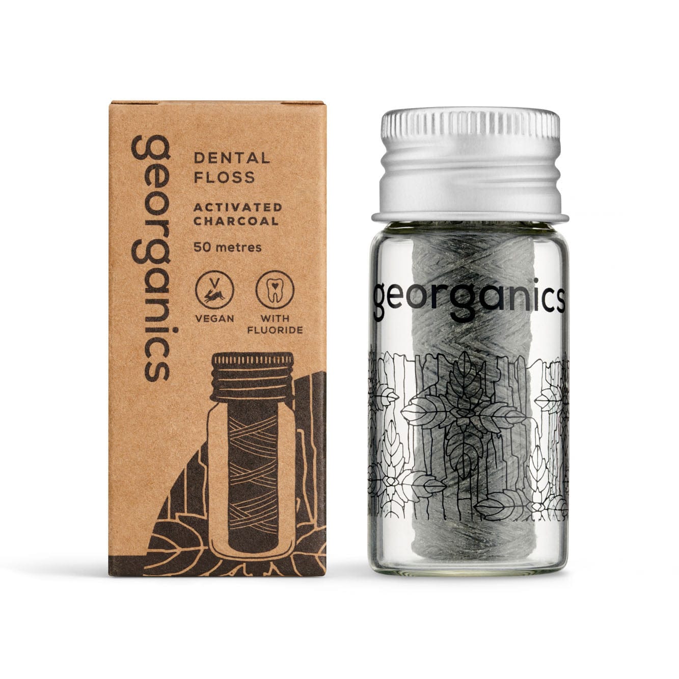 Georganics dental floss packaging with glass container and cardboard box on a white background