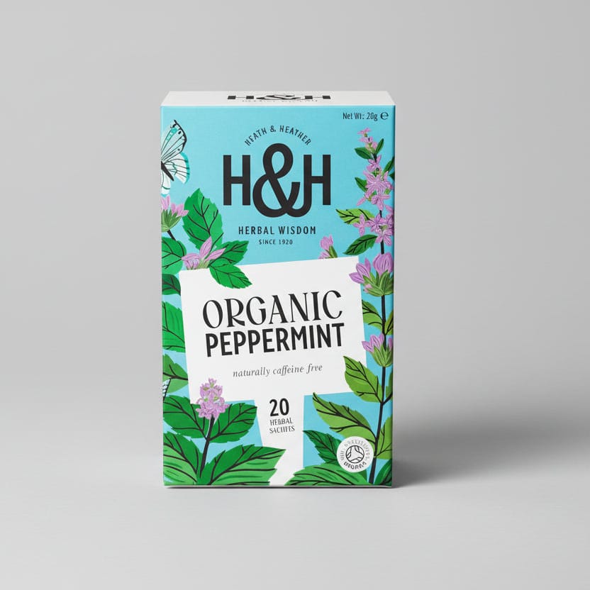 H&H Organic Peppermint tea on a gray background