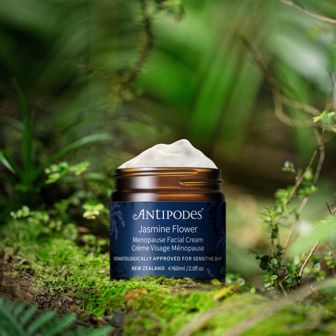 Antipodes Jasmine Flower Menopause Facial Cream jar on a natural background