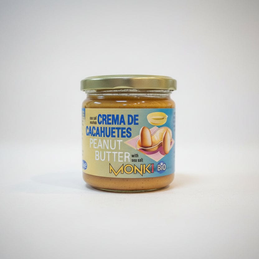 Jar of Monki Bio peanut butter with a blue label on a white background