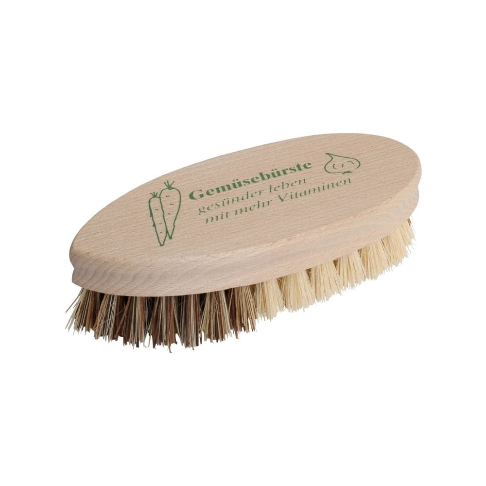 Vegetable cleaning brush with wooden handle and natural bristles on a white background