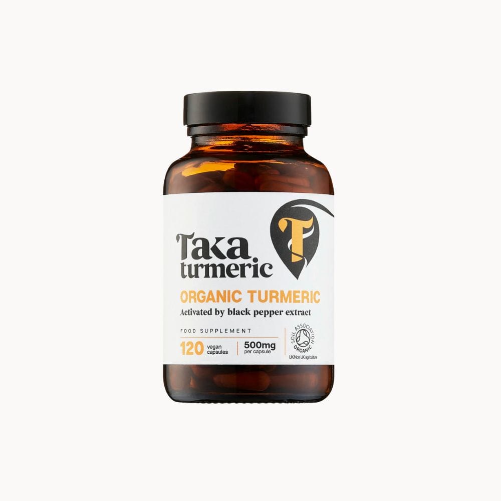 Bottle of Taka Turmeric organic turmeric supplement on a white background