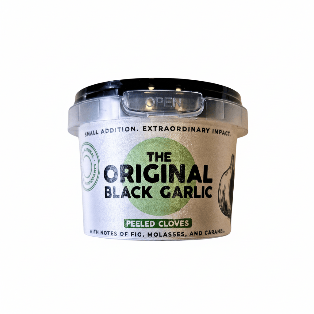 Container of 'The Original Black Garlic' with a clear lid on a white background