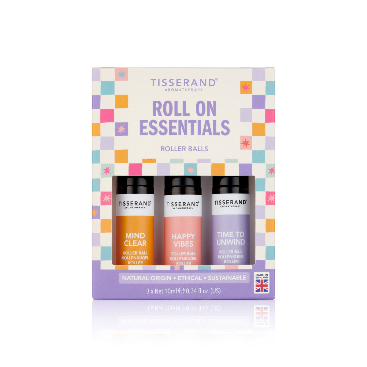 Tisserand Aromatherapy Roll On Essentials set containing three roller balls: Mind Clear, Happy Vibes, and Time to Unwind, presented in a colorful patterned box.