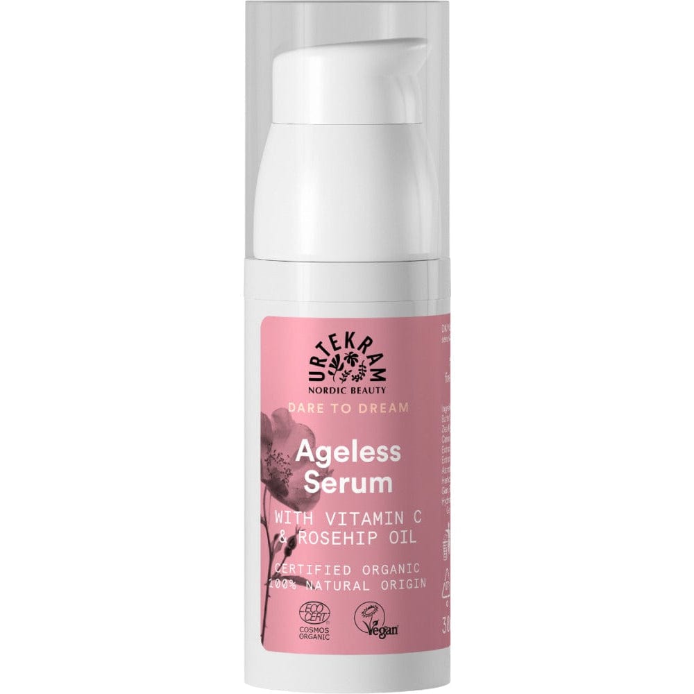 Urtekram Ageless Serum bottle with pink label on a white background
