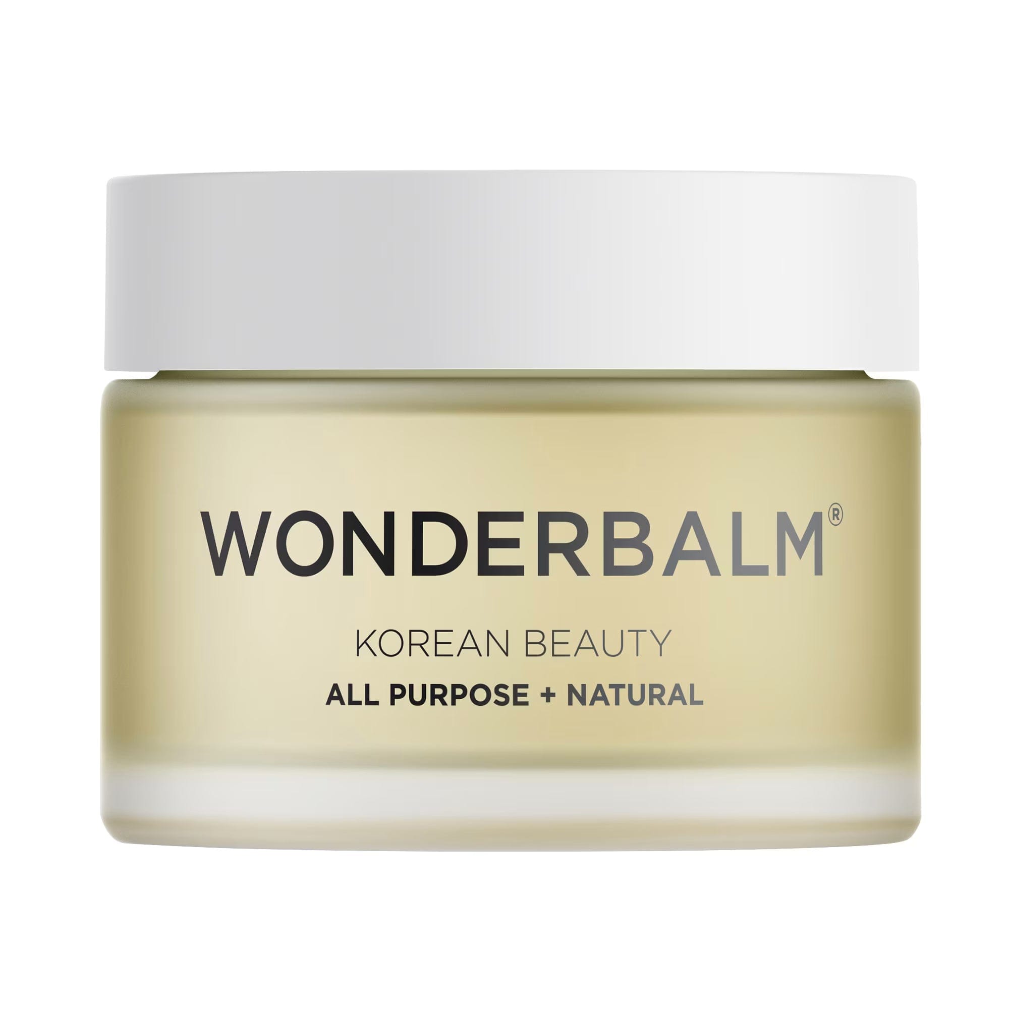 Wonderbalm Korean Beauty All Purpose + Natural jar with a white lid and pale yellow-beige container on a white background.