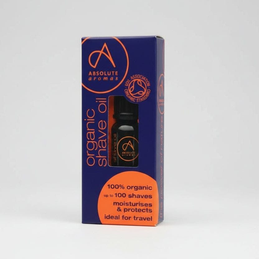 Absolute Aromas organic shave oil packaging on a white background