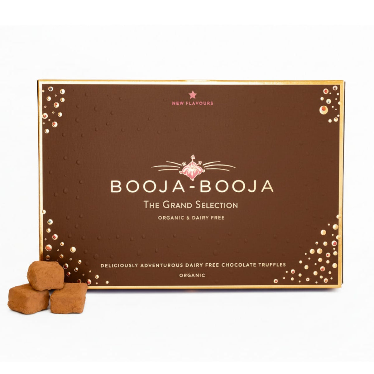 A rectangular brown chocolate truffle box labeled 'BOOJA-BOOJA THE GRAND SELECTION' with gold decorative corner details, shown on a white background with three brown chocolate truffles placed in front.