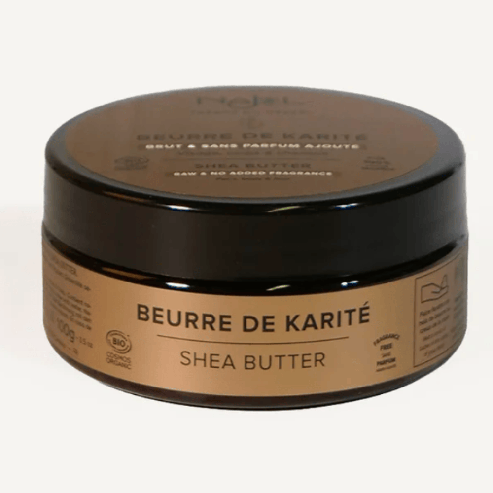 A round jar of Najel Beurre de Karité Shea Butter with a dark brown lid and a beige label, shown on a plain white background.