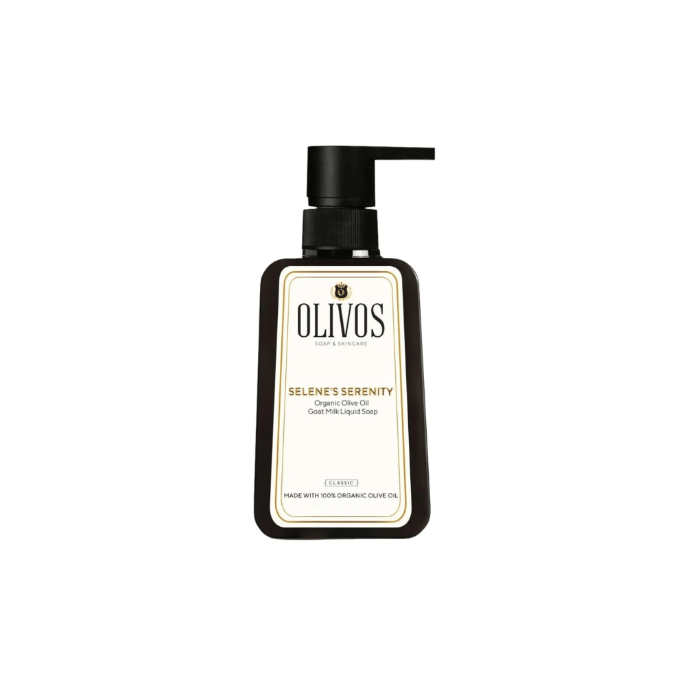 A bottle of OLIVOS Selene's Serenity Cleanse Paks liquid soap in Ceramict, featuring a black bottle with a cream-colored label and a black pump dispenser, set against a plain white background.