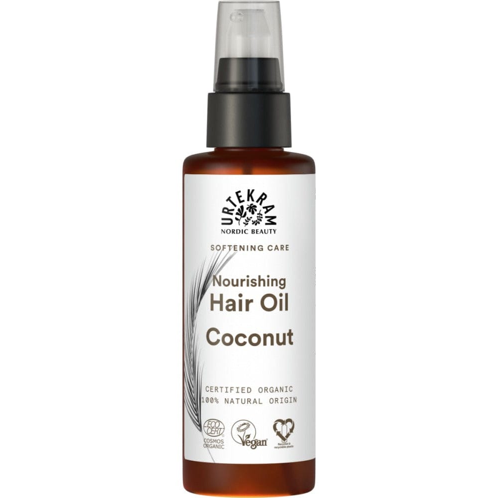 Urtekram coconut nourishing hair oil bottle on a white background