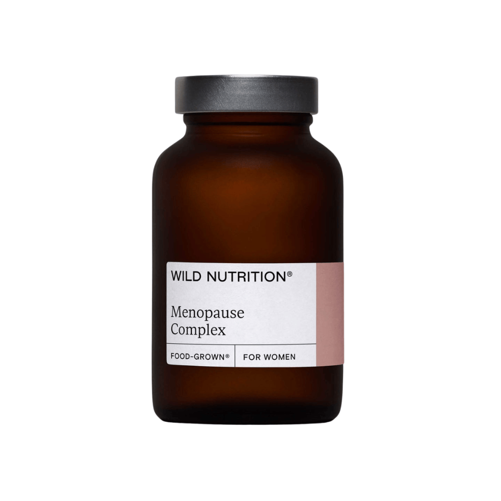Amber supplement bottle labeled 'Wild Nutrition Menopause Complex' on a white background